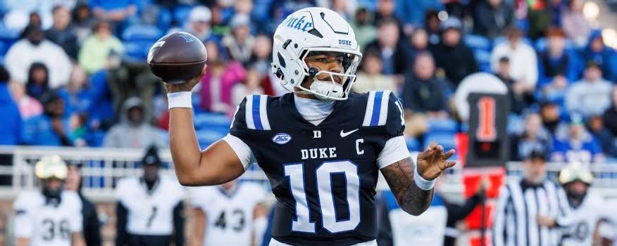 Duke quarterback Darian Mensah practicing on the field before a game in Durham, North Carolina.