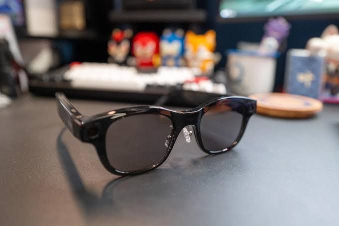 Close-up view of the HTC VIVE Eagle smart glasses frame showing the adjustable nose pads for fit.