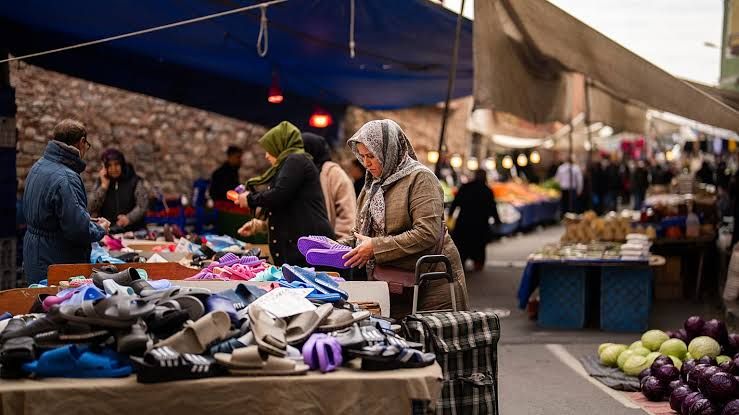Shoppers at a busy street market in Istanbul, Turkey.