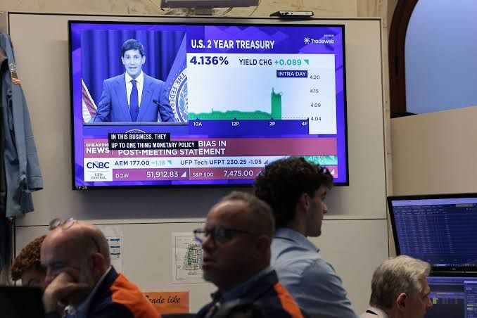 Bitcoin chart visualization and financial market data representing $2.5 billion in derivatives bets on a $72,000 price target.