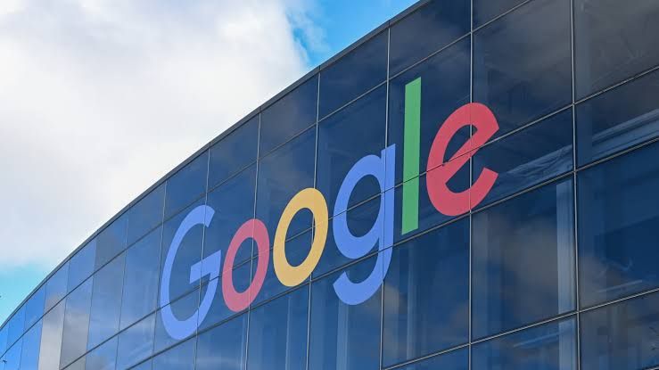 A view of the Google Headquarters building exterior during a clear day with the corporate logo visible.