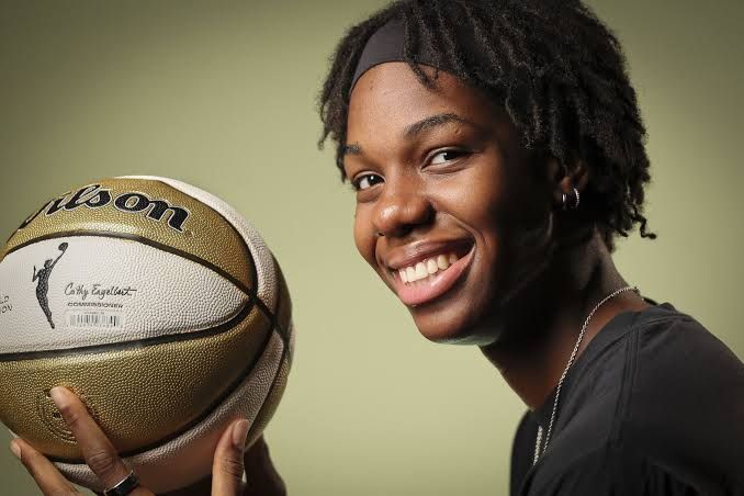 Seattle Storm center Dominique Malonga standing on the court during a WNBA game.