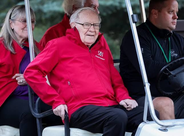 Warren Buffett speaking during a televised interview about Berkshire Hathaway investment strategy and AI spending trends.