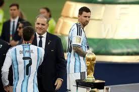 Lionel Messi holds his second-place medal after the 2026 World Cup final loss to Spain.