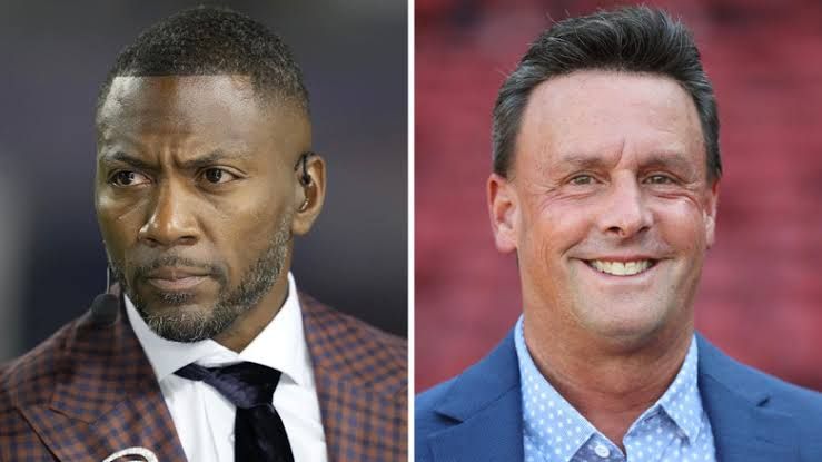 Ryan Clark and Karl Ravech posing during their tenure as ESPN commentators.