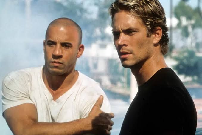 Vin Diesel and Paul Walker on set for Fast Five during a scene in 2011.
