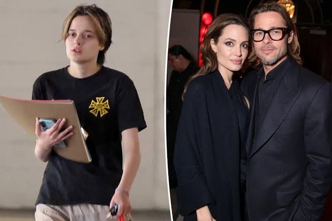 Angelina Jolie and Brad Pitt standing together at a red carpet event during their marriage.