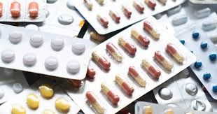 Close up of cetirizine hydrochloride pill bottles at a pharmacy counter during an FDA safety recall.