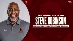 Steve Robinson posing for a professional portrait as the new Special Assistant to the Head Coach for Elon University.
