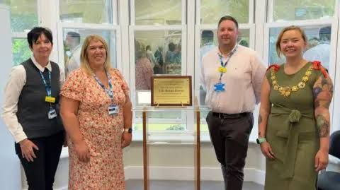 Mayor of Dover Bekah Dawes stands with NHS staff during the reopening ceremony of the refurbished Coleman House.