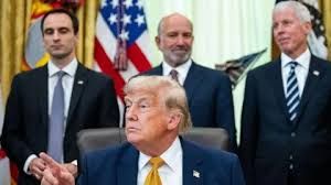 US President Donald Trump and cabinet officials attending an executive order signing at the White House.