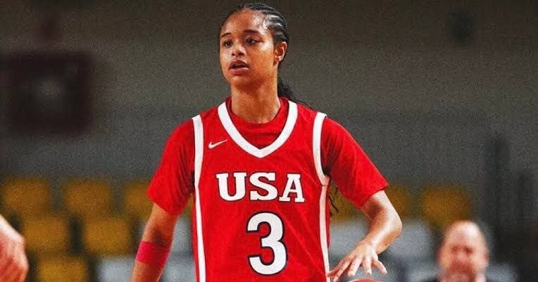 Zennia Thomas and teammates celebrate a play during Rutgers' 101-51 win against Peru at the FISU America Games.