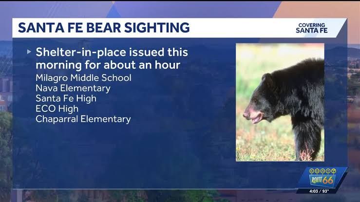 Santa Fe Public Schools sign near a campus as officials monitor the area for wildlife activity.