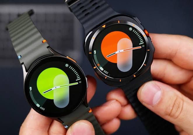 Samsung Galaxy Watch wearable device held in hand representing the brand's current smartwatch product line.