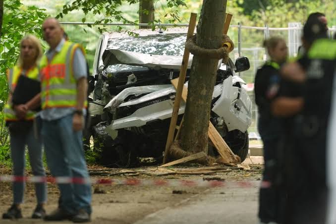 Police presence near a damaged van at the scene of the attack in Berlin during the Christopher Street Day festival.