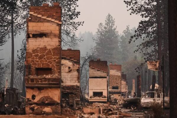 Burned remains of a neighborhood in Spokane, Washington, following the Old Trails wildfire.