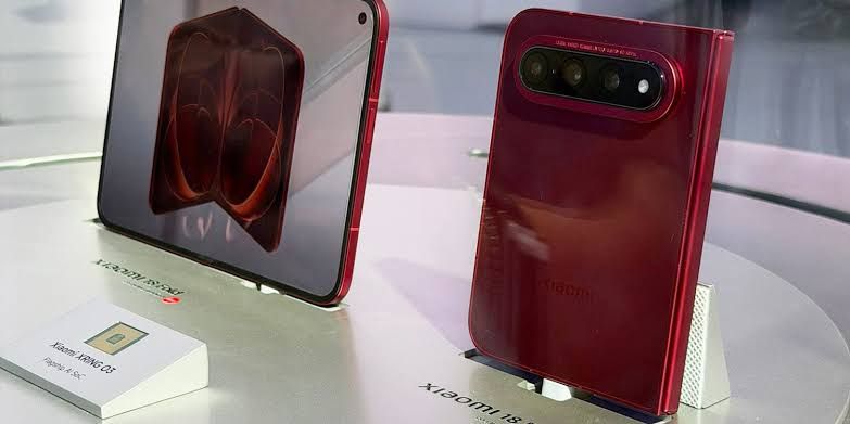 The Xiaomi 18 Fold displayed on a table at IFA 2026 showing its wide form factor and rounded corners.