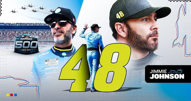 Jimmie Johnson standing next to his race car during a NASCAR Cup Series event.