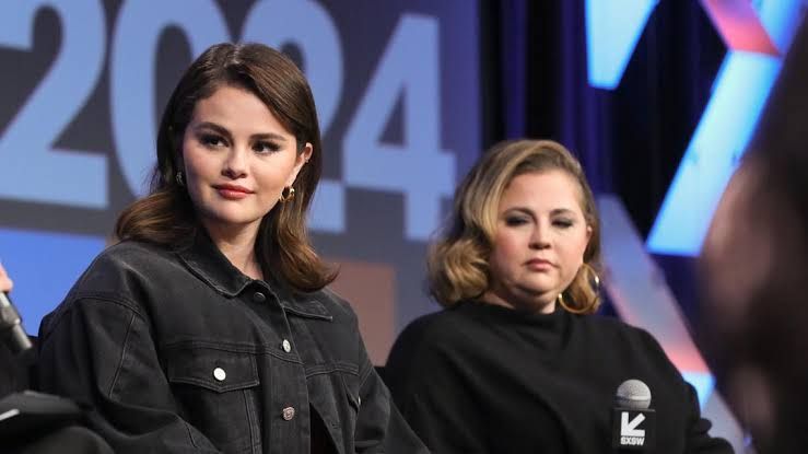 Selena Gomez speaking at a public event about her mental health initiative Wondermind.