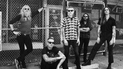 Mastodon band members posing for a promotional photo ahead of their Marrow Deep album release.