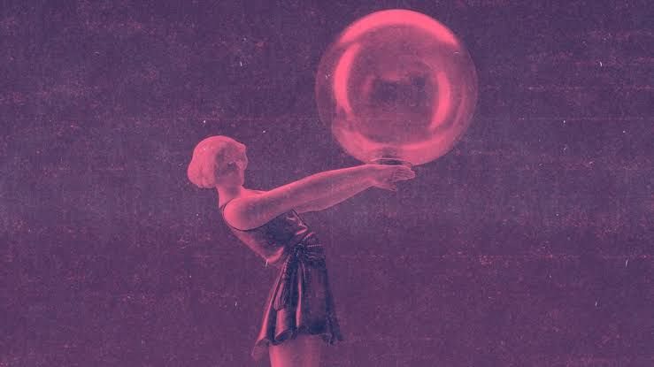 A pink-tinted illustration of a woman holding a large, fragile bubble representing the current AI market expansion.