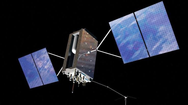 Artist impression of a third-generation GPS satellite orbiting Earth, used to monitor space radiation levels.