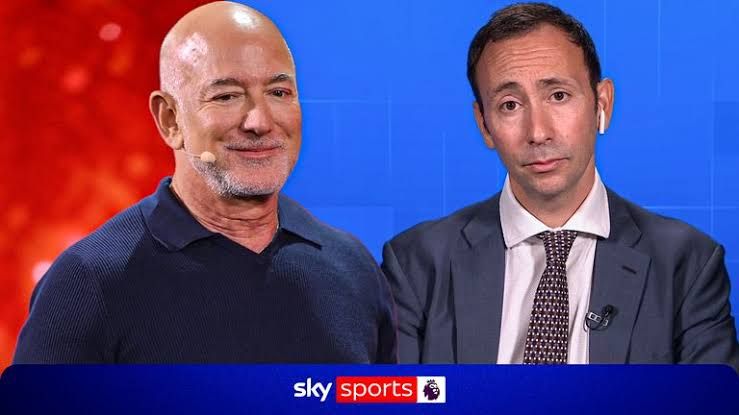 Jeff Bezos and Amit Bhatia in the context of potential investment talks for a minority stake in Liverpool Football Club.