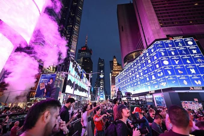 Pokémon Go players participate in a 1,000-person raid battle in Times Square to celebrate the game's 10th anniversary.
