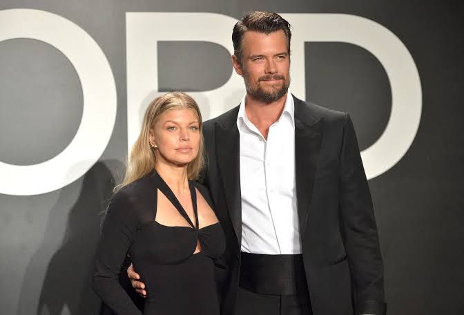 Fergie and Josh Duhamel pose together during a past event before their separation.