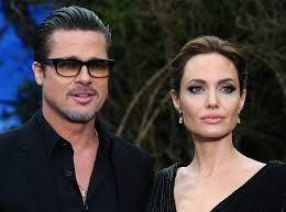 Vivienne Jolie-Pitt, 18, smiling during a public appearance, illustrating the news of her legal surname change.