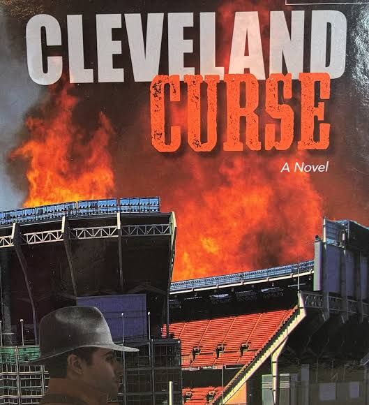 Author Dave Eifert poses with his book Cleveland Curse which examines the history of the Cleveland Browns.
