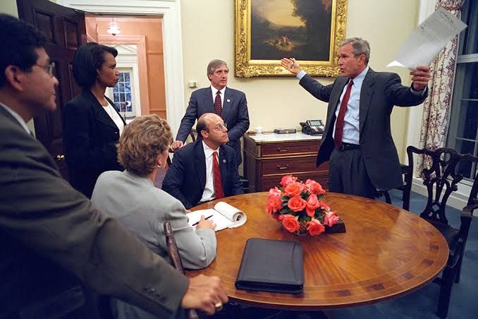 President George W. Bush speaking at a formal press conference in the White House during his second term.