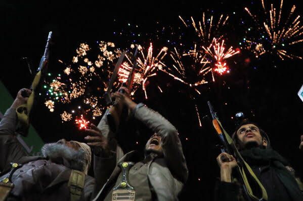 Houthi supporters in Yemen rally in Sanaa following the announcement of a maritime embargo against Saudi Arabia.