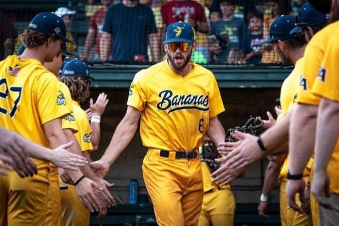 Tristan Peters wearing a baseball uniform during a professional practice session at a stadium.