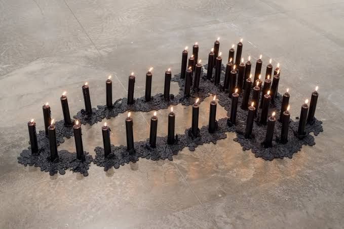 Ana Mendieta's Bird Run 1974 is displayed at the Tate Modern retrospective featuring her earth-body art.