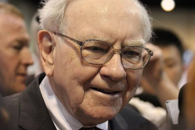 Warren Buffett speaking during a televised interview about stock market valuation trends.