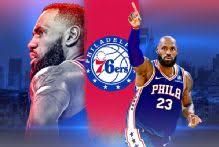 LeBron James' blue No. 23 Philadelphia 76ers jersey hanging in a locker with a crown resting on the shelf above.