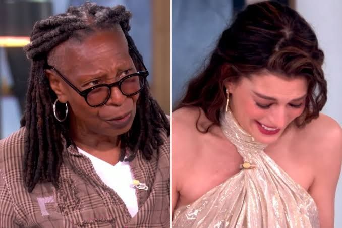 Whoopi Goldberg and Anne Hathaway speaking during an emotional segment on the set of The View.
