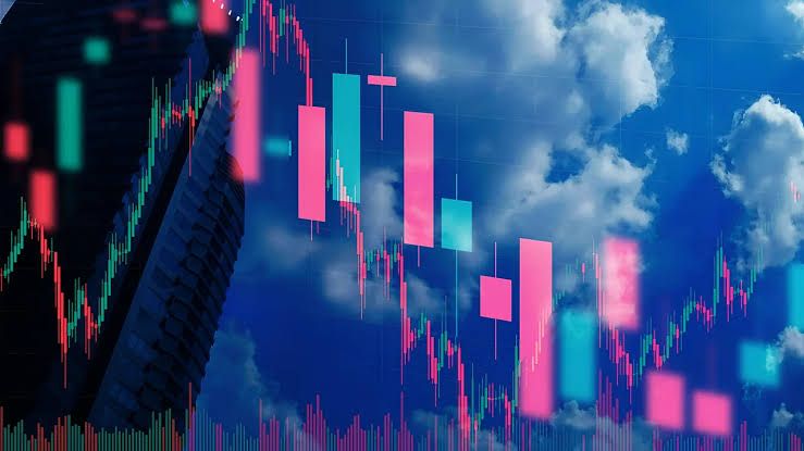 A stock market candlestick chart overlaid on a cloudy sky represents advisor concerns about the economic outlook.