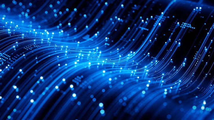 Digital waves of data flowing in a 3D visualization representing quantum computing security risks.