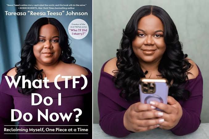 Tareasa Johnson holding her new book cover in a professional portrait.
