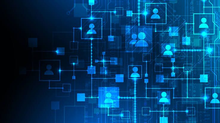 Network of interconnected human icons representing global computing collaboration.
