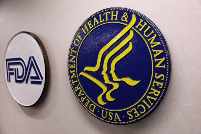 Medicare insurance paperwork displayed with a medical stethoscope and modern tablet showing data analytics.