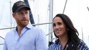 Prince Harry and Meghan walking together during a recent public appearance in the UK.