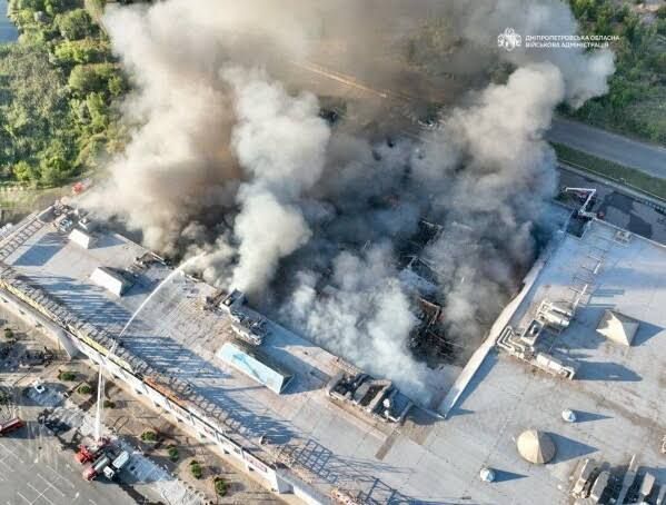 Firefighters battle a massive fire at a shopping mall in Kryvyi Rih after a Russian drone strike on August 21, 2026.