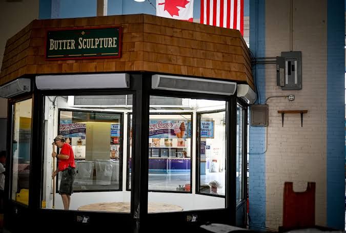 Jim Victor and Marie Pelton prepare for the annual NYS Fair butter sculpture in a refrigerated studio.