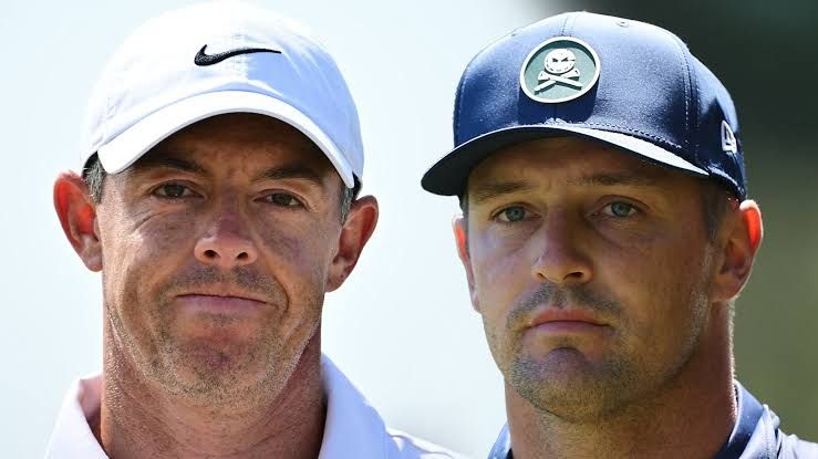 Sam Burns shakes hands with Bryson DeChambeau after their round at The Open at Royal Birkdale.