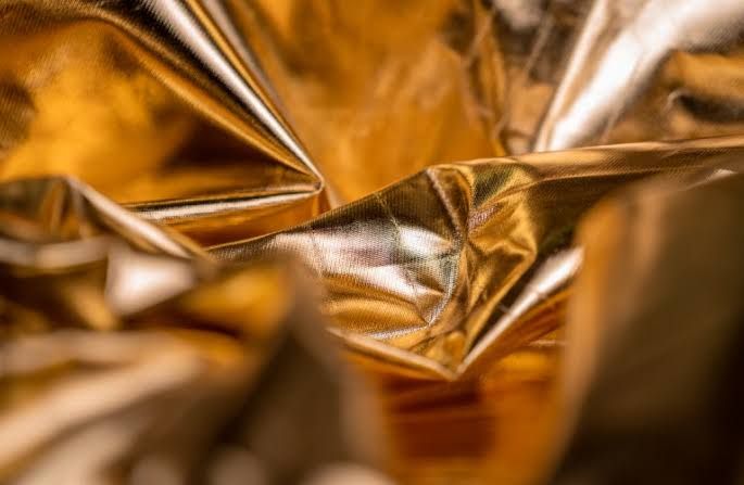 Close-up of gold nanoparticles used in quantum research at a university laboratory.