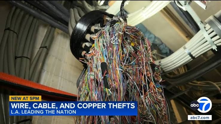 Los Angeles County Sheriff's Department investigates a cut cable line following a service outage in Southern California.