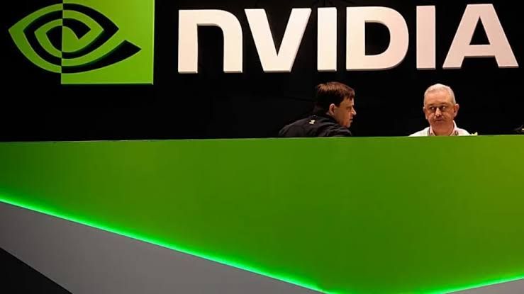 Nvidia CEO Jensen Huang presenting at a corporate event focused on the company's new AI chip technology and infrastructure.